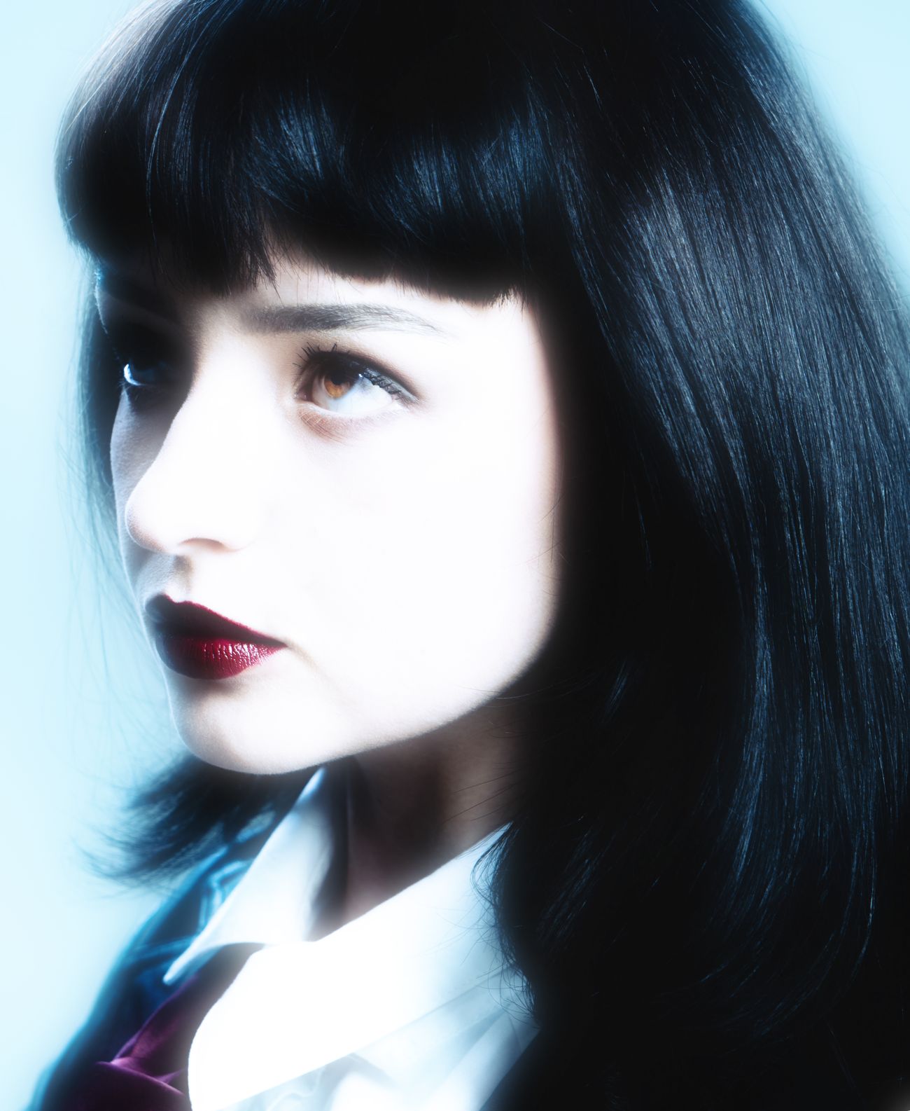 Portrait of Irina Dengina in soft blue light